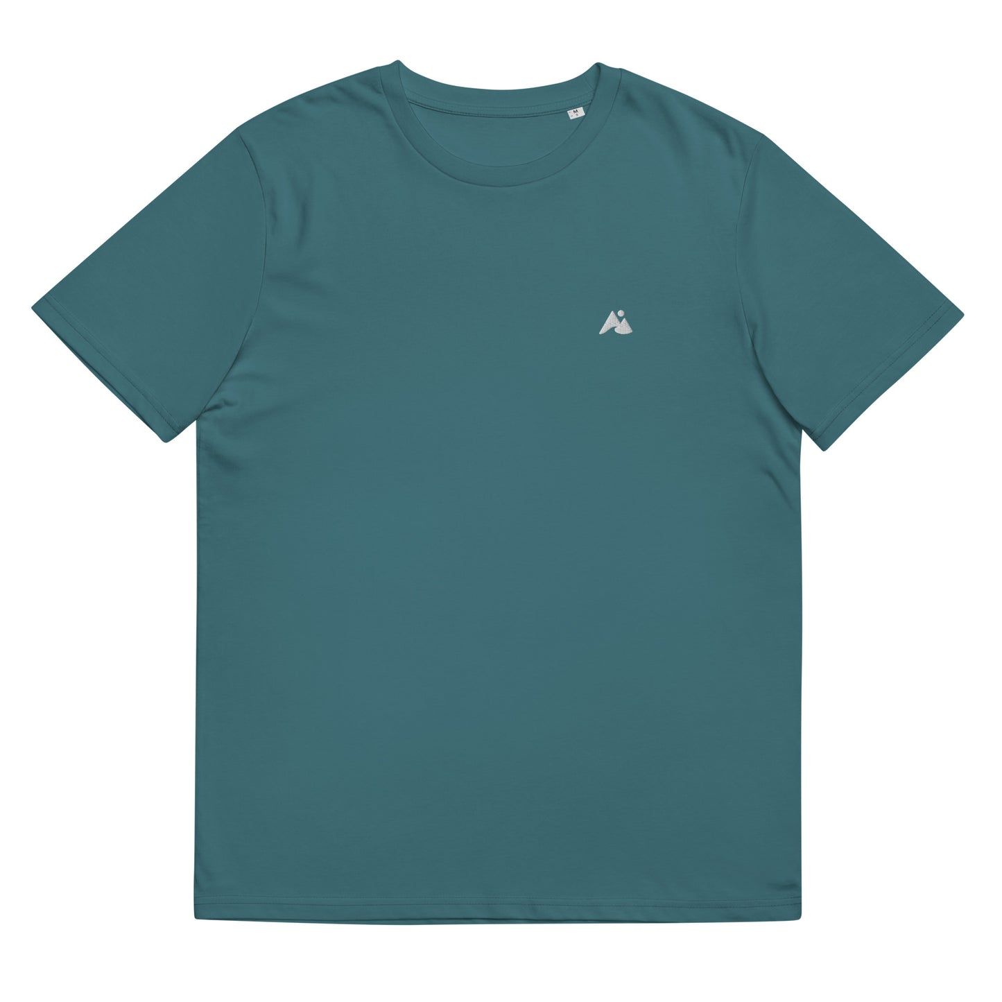 Il s'agit d'une image d'un t-shirt unisexe de couleur bleu canard. Le t-shirt est présenté sur un fond blanc. Il y a un petit logo montagne et vague blanc sur la poitrine côté cœur.